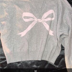 Gray Sweater with Pink Bow Design